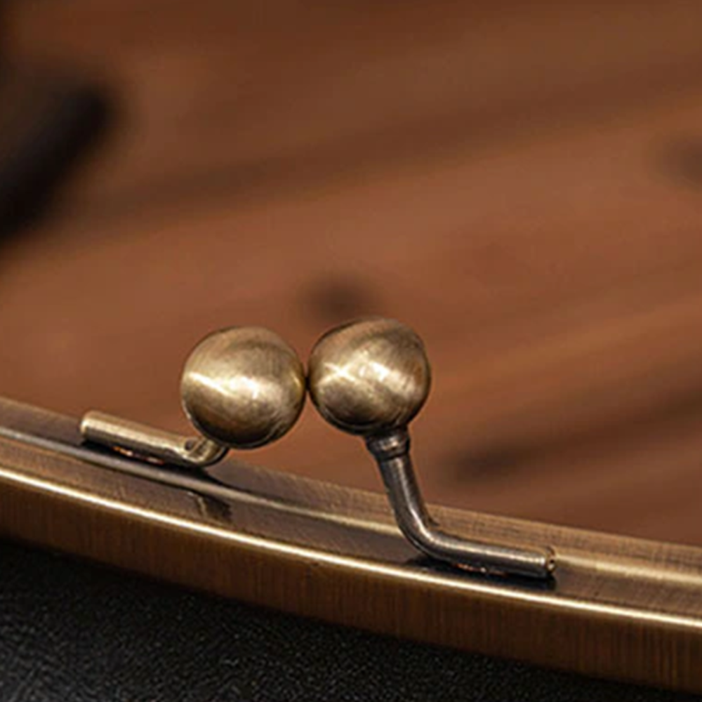 Borsa vintage Kiss-Lock - L'essenziale retrò chic di Grace