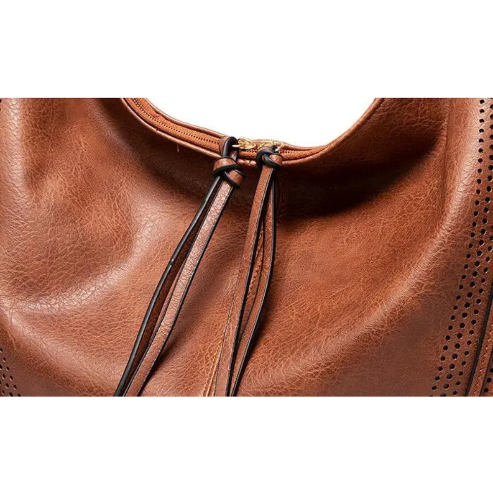 La versatilità classica di Minerva | Borsa vintage